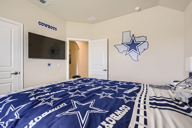 3446 Kirby Ln, Forney, TX 75126 - bedroom featuring arched walkways and lofted ceiling
