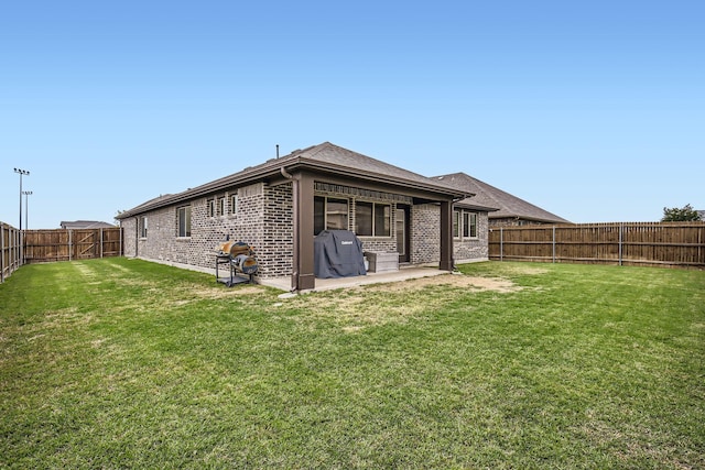 3446 Kirby Ln, Forney, TX 75126 - rear view of property featuring a patio area and brick siding