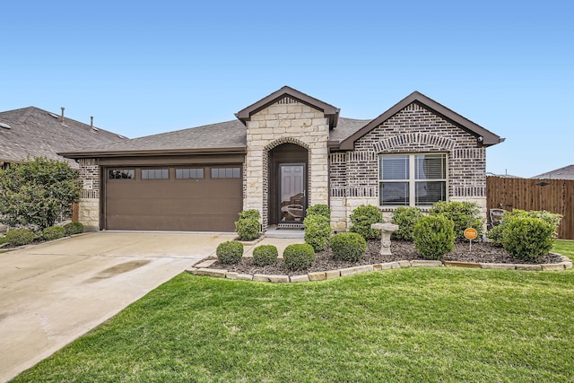 3446 Kirby Ln, Forney, TX 75126 - french provincial home with stone siding, an attached garage, driveway, and roof with shingles