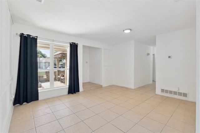 2425 Misty Ln, Carrollton, TX 75006 - empty room featuring light tile patterned flooring