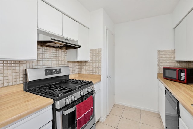 2425 Misty Ln, Carrollton, TX 75006 - kitchen featuring stainless steel gas range oven, under cabinet range hood, dishwasher, white cabinets, and light tile patterned floors