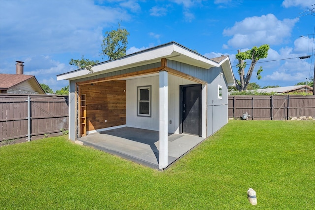 2425 Misty Ln, Carrollton, TX 75006 - rear view of house featuring a patio area
