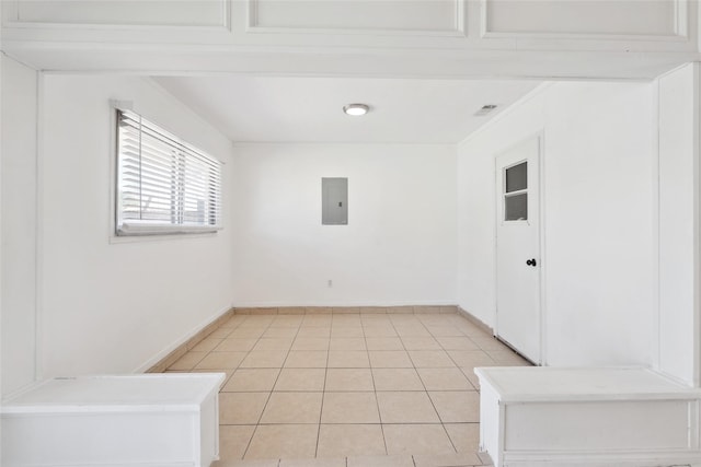 2425 Misty Ln, Carrollton, TX 75006 - spare room with electric panel, baseboards, and light tile patterned floors