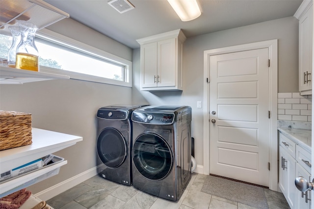 4017 Piedmont Rd, Fort Worth, TX 76116 - laundry area with cabinet space, separate washer and dryer, and baseboards