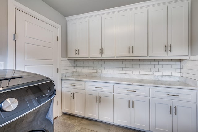 4017 Piedmont Rd, Fort Worth, TX 76116 - laundry room with cabinet space and washer / dryer