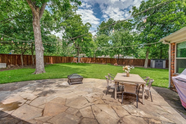4017 Piedmont Rd, Fort Worth, TX 76116 - view of patio with outdoor dining area and an outdoor fire pit