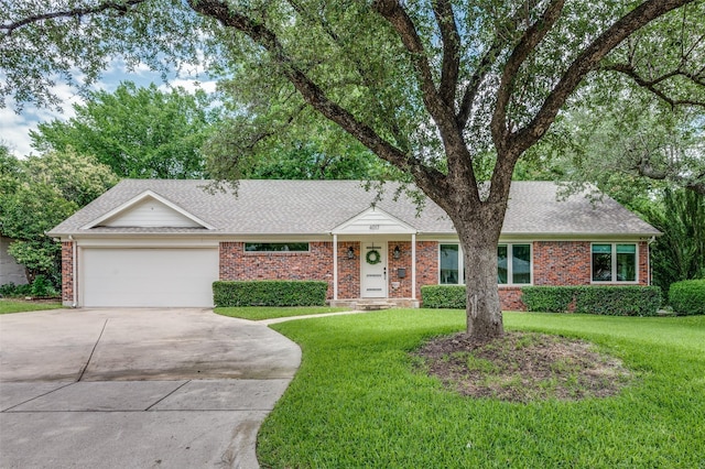 4017 Piedmont Rd, Fort Worth, TX 76116 - ranch-style home featuring driveway, a front yard, a garage, and brick siding