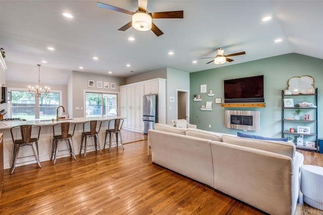 4017 Piedmont Rd, Fort Worth, TX 76116 - living area with ceiling fan, light wood-style floors, recessed lighting, a chandelier, and vaulted ceiling