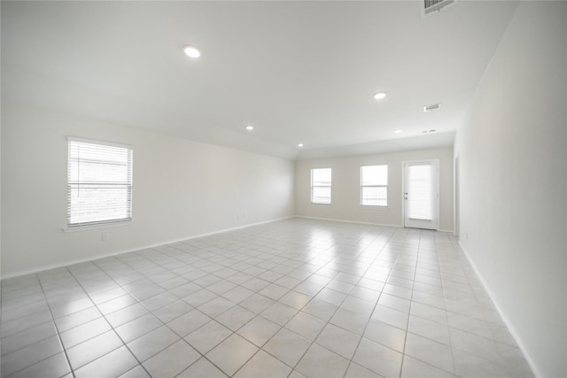 708 Rustic Meadows Trl, Princeton, TX 75407 - spare room featuring baseboards, light tile patterned flooring, and recessed lighting