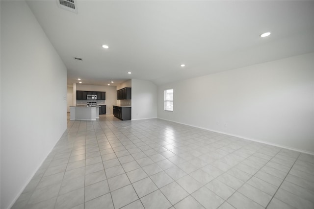 708 Rustic Meadows Trl, Princeton, TX 75407 - unfurnished living room featuring recessed lighting, light tile patterned flooring, and baseboards