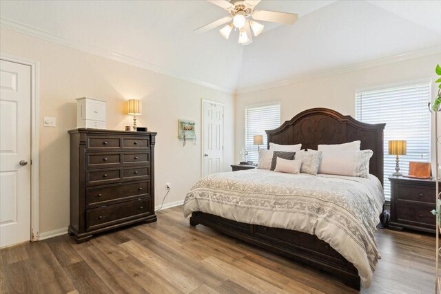 713 Tahoe Trl, Hewitt, TX 76643 - bedroom with multiple windows, dark wood-style flooring, baseboards, vaulted ceiling, and ornamental molding