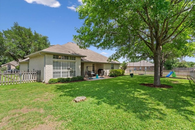 713 Tahoe Trl, Hewitt, TX 76643 - rear view of property with brick siding and a patio area