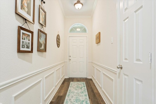 713 Tahoe Trl, Hewitt, TX 76643 - doorway to outside with ornamental molding, a decorative wall, dark wood-type flooring, and a wainscoted wall