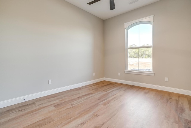 8732 Fullerton Dr, Cleburne, TX 76033 - empty room featuring plenty of natural light, light wood-style flooring, a ceiling fan, and baseboards