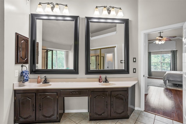 7705 Marble Canyon Ct, Fort Worth, TX 76137 - ensuite bathroom with double vanity, tile patterned flooring, baseboards, a ceiling fan, and ornamental molding