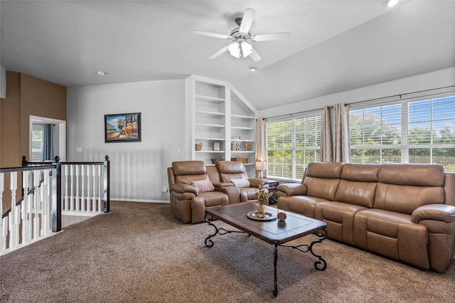 7705 Marble Canyon Ct, Fort Worth, TX 76137 - carpeted living area with lofted ceiling, healthy amount of natural light, a ceiling fan, and built in shelves