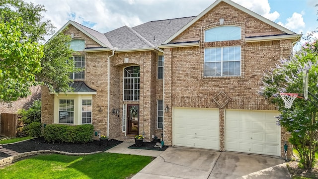 7705 Marble Canyon Ct, Fort Worth, TX 76137 - traditional home featuring driveway, an attached garage, brick siding, and a shingled roof