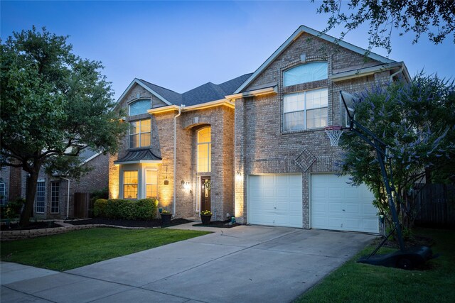 7705 Marble Canyon Ct, Fort Worth, TX 76137 - traditional home featuring driveway, brick siding, an attached garage, and a front yard