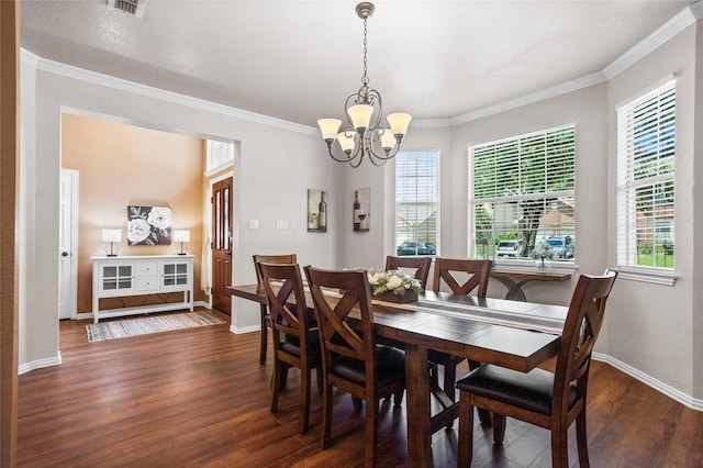 7705 Marble Canyon Ct, Fort Worth, TX 76137 - dining area with wood finished floors, a chandelier, crown molding, and baseboards