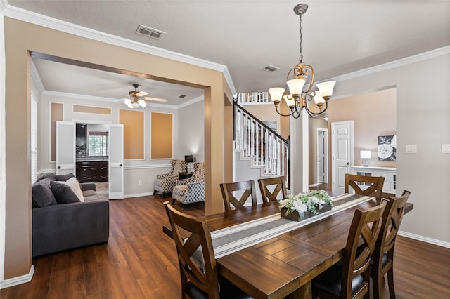 7705 Marble Canyon Ct, Fort Worth, TX 76137 - dining room with dark wood-style floors, crown molding, a chandelier, stairway, and a ceiling fan