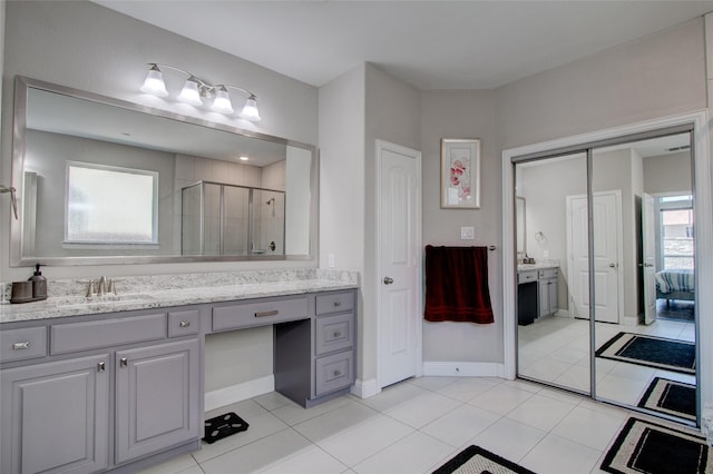 12990 Twelve Oaks Ave, Frisco, TX 75035 - ensuite bathroom with a stall shower, vanity, and tile patterned flooring