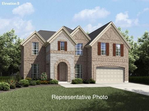 12990 Twelve Oaks Ave, Frisco, TX 75035 - view of front of home featuring an attached garage, concrete driveway, a front lawn, and stone siding