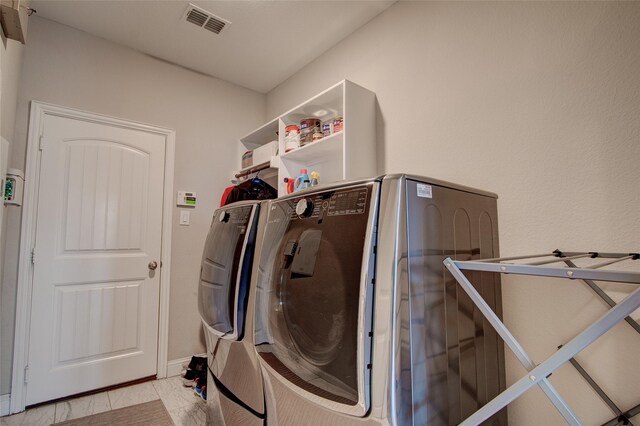 12990 Twelve Oaks Ave, Frisco, TX 75035 - laundry area featuring washer and dryer