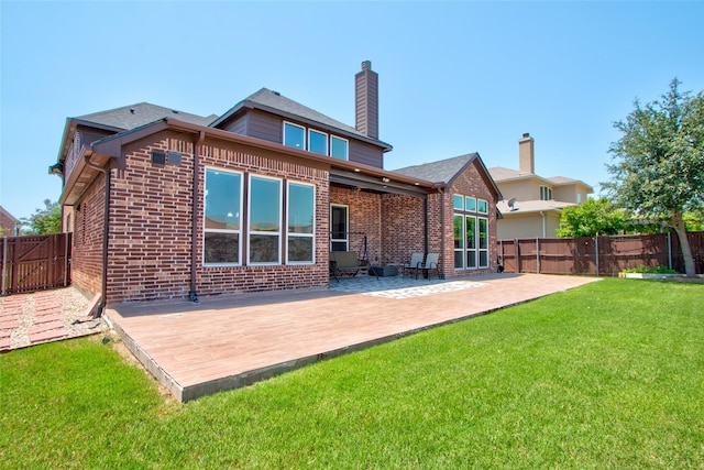 12990 Twelve Oaks Ave, Frisco, TX 75035 - rear view of property with brick siding, a patio area, and a chimney