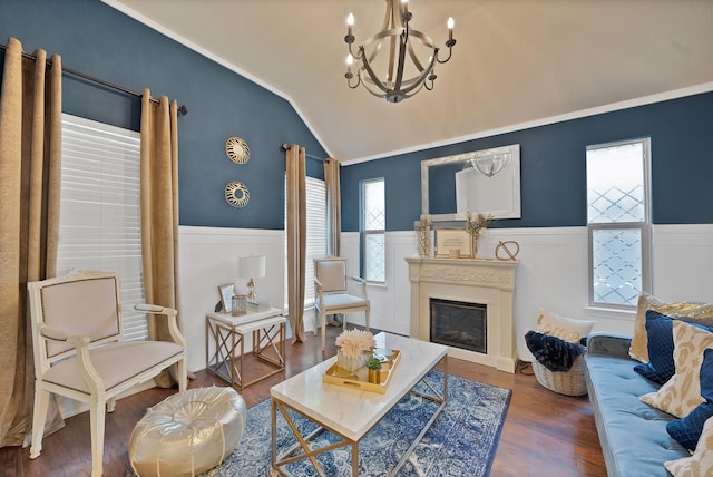 11913 Bellegrove Rd, Burleson, TX 76028 - living room with wainscoting, a chandelier, lofted ceiling, wood finished floors, and a fireplace