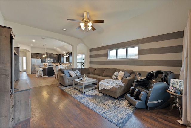 11913 Bellegrove Rd, Burleson, TX 76028 - living room with arched walkways, a ceiling fan, hardwood / wood-style floors, and vaulted ceiling