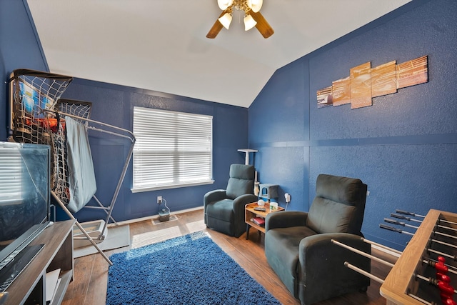 11913 Bellegrove Rd, Burleson, TX 76028 - living area with a ceiling fan, vaulted ceiling, wood finished floors, and a textured wall