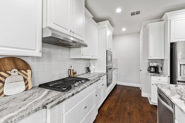 2851 Clearwater Dr, Prosper, TX 75078 - kitchen featuring under cabinet range hood, appliances with stainless steel finishes, white cabinets, and recessed lighting