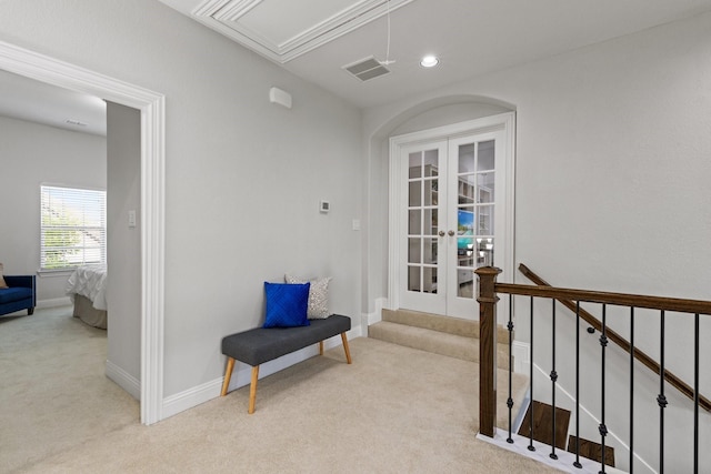 2851 Clearwater Dr, Prosper, TX 75078 - corridor featuring light carpet, french doors, attic access, and baseboards