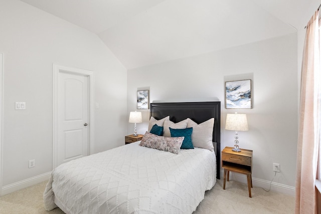 2851 Clearwater Dr, Prosper, TX 75078 - bedroom featuring light carpet, vaulted ceiling, and baseboards