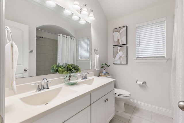2851 Clearwater Dr, Prosper, TX 75078 - bathroom featuring double vanity, tile patterned floors, toilet, curtained shower, and baseboards