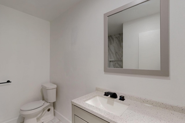 1723 Overbrook Dr, Arlington, TX 76014 - bathroom with vanity, toilet, and baseboards