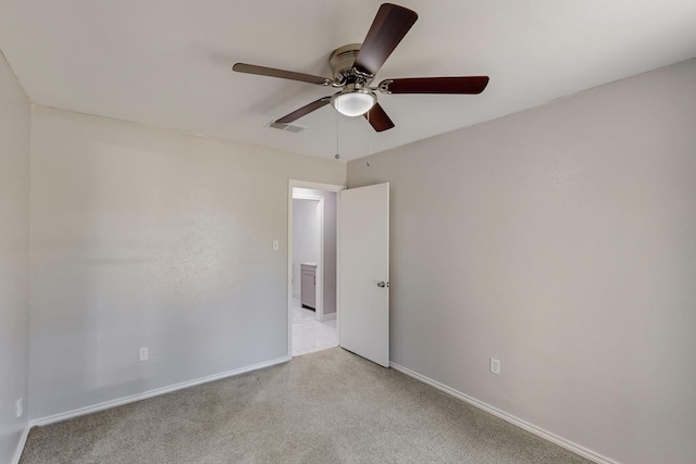 1723 Overbrook Dr, Arlington, TX 76014 - unfurnished room with a ceiling fan, light carpet, and baseboards