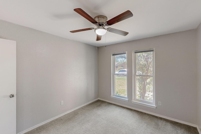1723 Overbrook Dr, Arlington, TX 76014 - carpeted spare room with baseboards and a ceiling fan