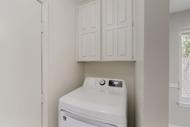 1723 Overbrook Dr, Arlington, TX 76014 - laundry room with washer / dryer and cabinet space