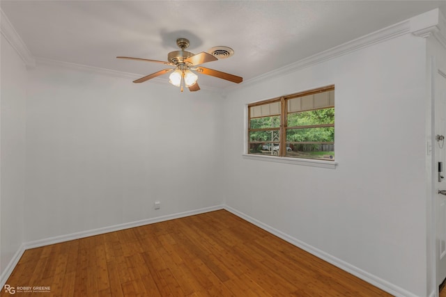 2932 W Cavett Dr, Shreveport, LA 71104 - unfurnished room featuring ornamental molding, hardwood / wood-style floors, a ceiling fan, and baseboards