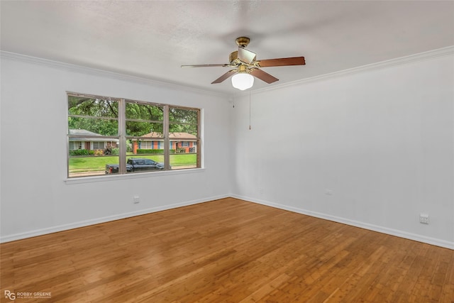2932 W Cavett Dr, Shreveport, LA 71104 - empty room featuring ornamental molding, ceiling fan, wood finished floors, and baseboards