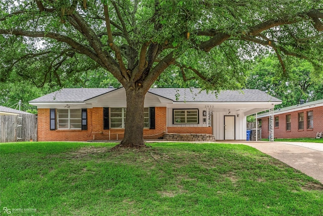 2932 W Cavett Dr, Shreveport, LA 71104 - ranch-style home with concrete driveway, brick siding, and a carport