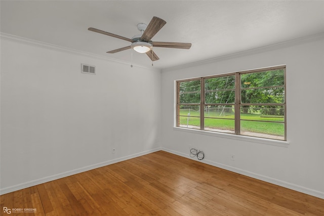 2932 W Cavett Dr, Shreveport, LA 71104 - spare room with light wood finished floors, baseboards, crown molding, and a ceiling fan