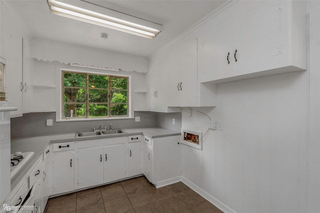 2932 W Cavett Dr, Shreveport, LA 71104 - kitchen with open shelves, a sink, white cabinets, and crown molding