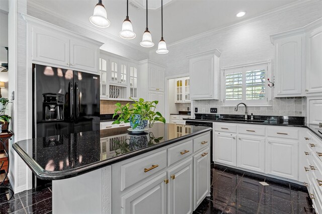 146 Shady Trl, Waco, TX 76657 - kitchen featuring granite tiled floors, black fridge with ice dispenser, a sink, white cabinets, and a center island