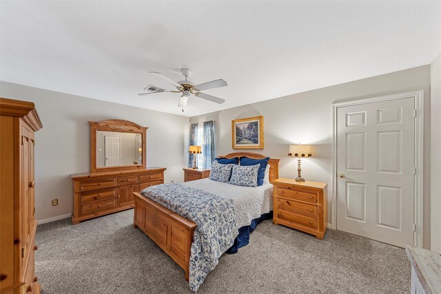 146 Shady Trl, Waco, TX 76657 - bedroom with light colored carpet, a ceiling fan, and baseboards