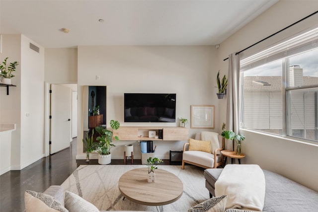 3025 Bryan St Unit 1F, Dallas, TX 75204 - living area with baseboards