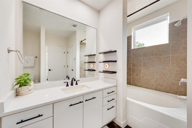 3025 Bryan St Unit 1F, Dallas, TX 75204 - full bathroom featuring vanity and shower / bathtub combination