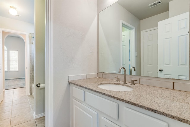 13274 Bayfield Dr, Frisco, TX 75033 - bathroom with tile patterned flooring, vanity, and baseboards