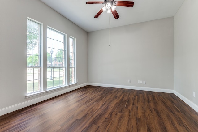 13274 Bayfield Dr, Frisco, TX 75033 - spare room featuring healthy amount of natural light, baseboards, dark wood-style floors, and ceiling fan